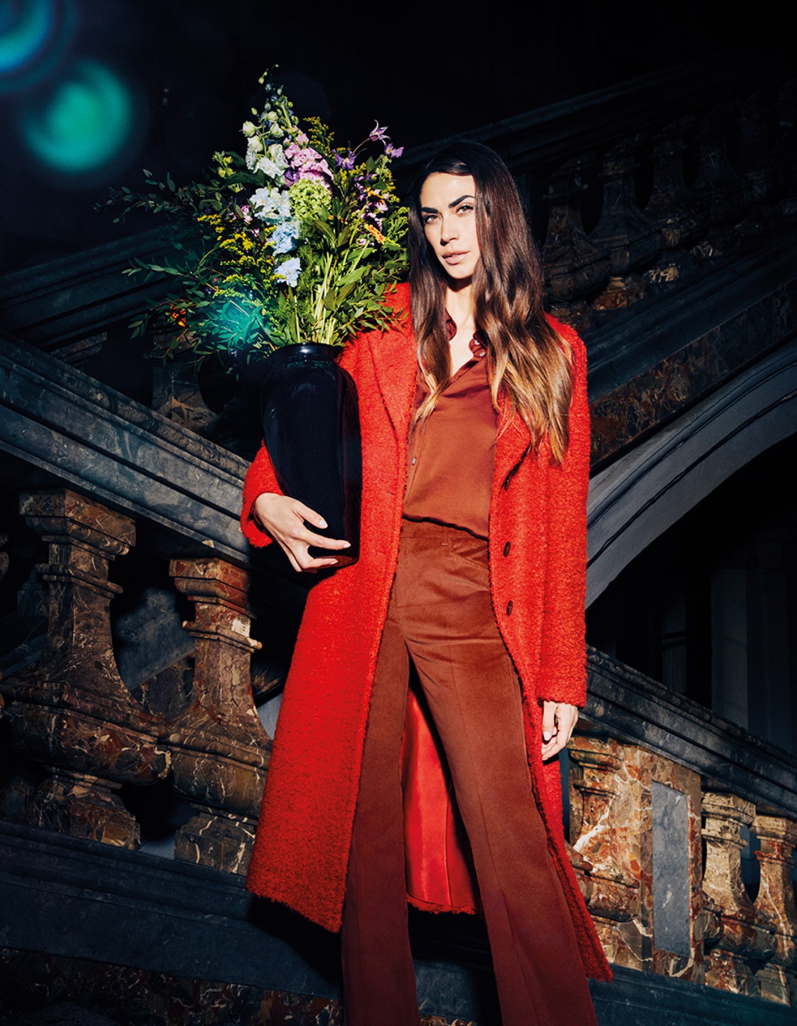 Editorial — red coat on a staircase