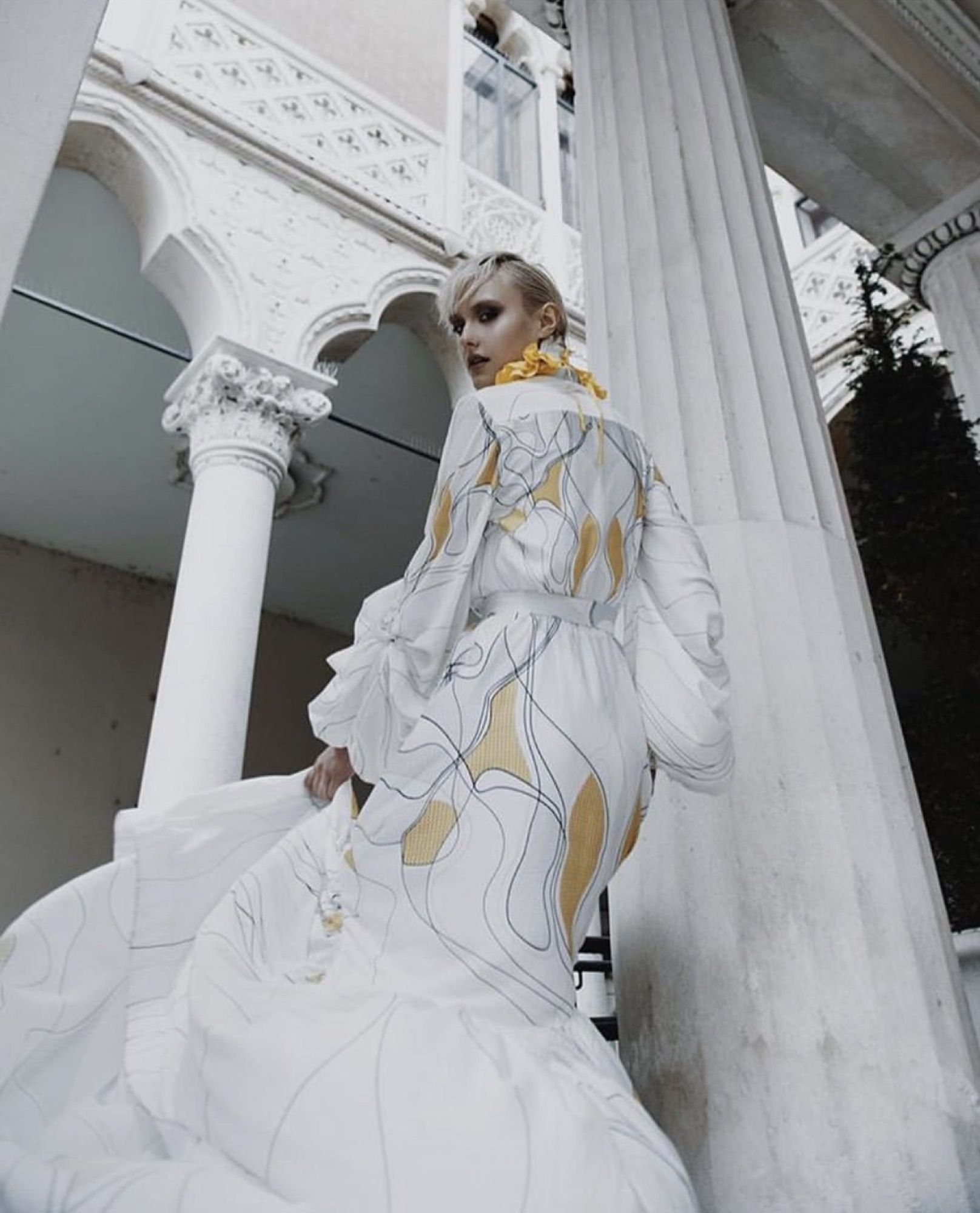 Editorial — sculptural gown, columns